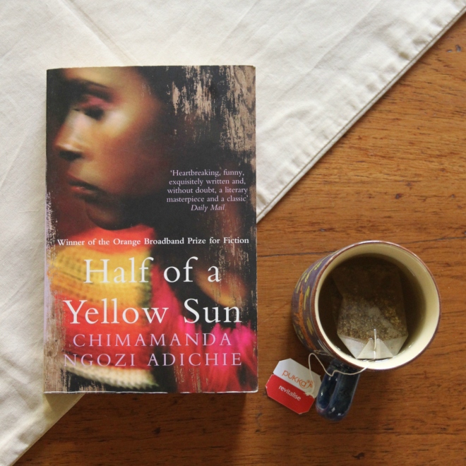 Half a Yellow Sun by Chimamanda Ngozi Adichie with a cup of my favourite cinnamon tea